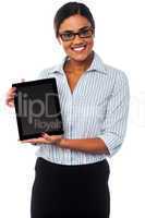 Sales representative displaying tablet pc for sale