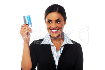 Woman displaying her credit card