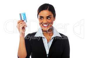 Woman displaying her credit card