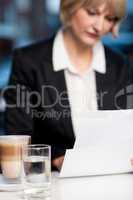 Blur image of business lady in background