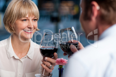 Couple toasting in a restaurant