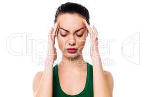 Asian woman having headache