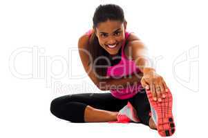 Fitness girl doing stretching exercise