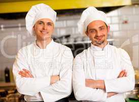 Smart and confident male chefs
