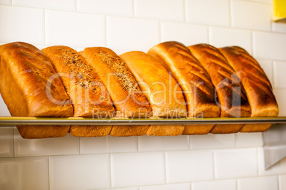 Freshly kneaded grain and white breads for sale