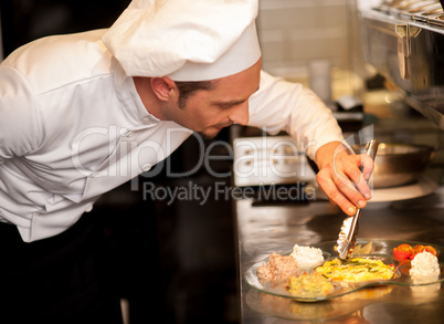 Finishing touches to the yummy meal