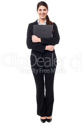 Pretty female secretary holding business files