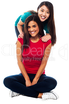 Young smiling girls posing for the camera