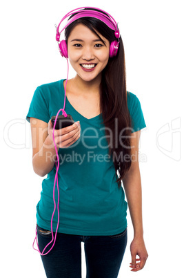 Pretty girl listening to music