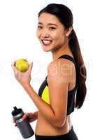 Eat healthy, stay fit. Smiling chinese girl.