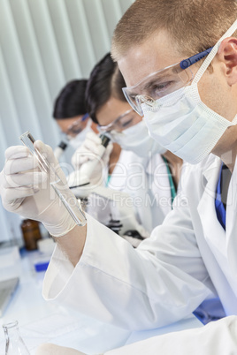 Male Scientist or Doctor With Test Tube In Laboratory