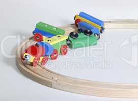 colorful wooden toy train and tracks