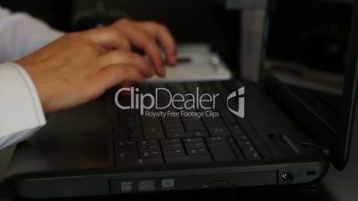businesswoman using her laptop computer
