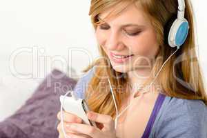 Fresh adolescent girl listening to music