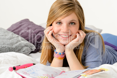 Dreamy girl dreaming about love over diary