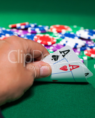 Colorful poker chips and two Ace