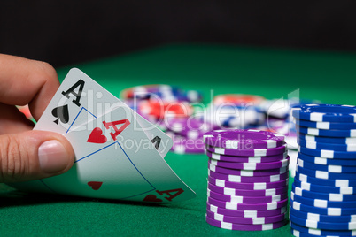 Colorful poker chips and two Ace