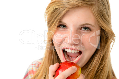 Teenage girl eating healthy apple