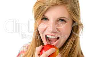 Teenage girl eating healthy apple