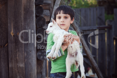 boy with little goat