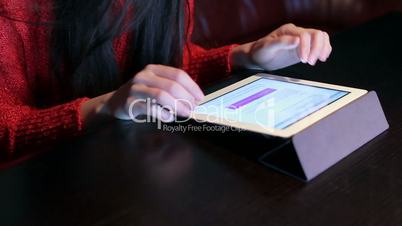 girl in a restaurant with a tablet