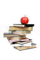 red apple on a book