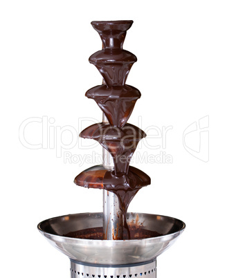 Chocolate fountain on white background