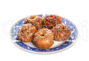 Baked apples in blue plate