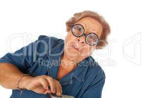 Elderly woman with calculator