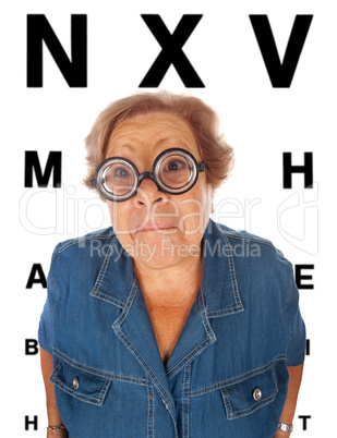 Elderly woman with table for eye exam