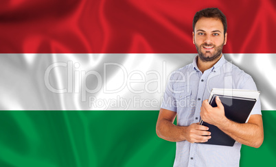 Male student of languages ??on Hungarian flag