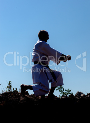 Adult men practicing Karate outdoor