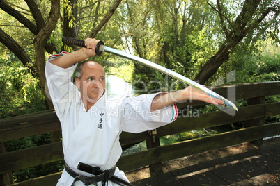 Adult men practicing Karate outdoor