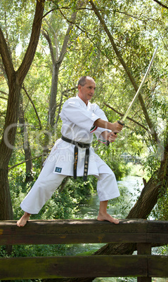 Adult men practicing Karate outdoor