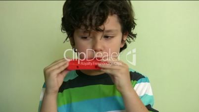 Child with harmonica