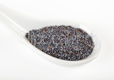 Poppy seeds in the spoon