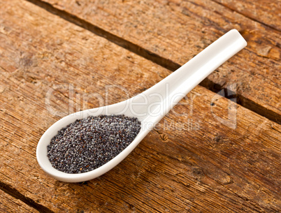 Poppy seeds in the spoon