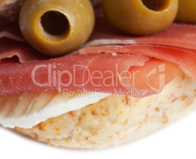 Sandwich with ham and olives with mozzarella