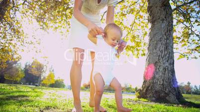 Baby Practicing First Steps