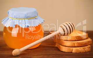 pot of honey and rusks