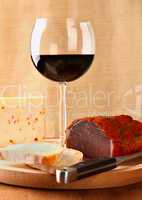 Red wine with italian cheese and capocollo