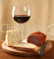 Red wine with italian cheese and capocollo