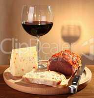 Red wine with italian cheese and capocollo