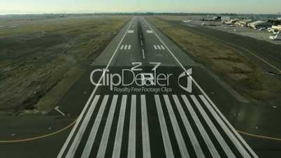 Aerial time lapse view of a plane landing