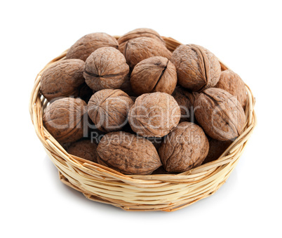 wicker basket with walnuts