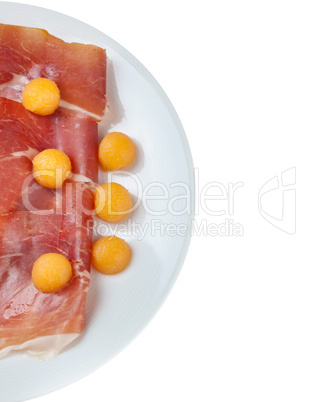 Raw prosciutto with melon