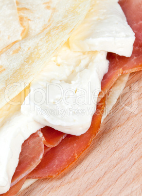 Italian piadina with ham and mozzarella cheese