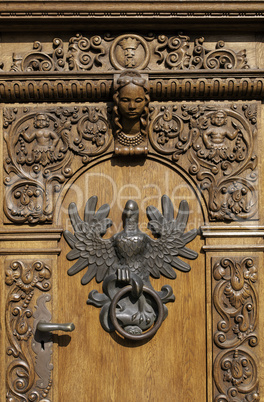 Oolish eagle and door knocker.
