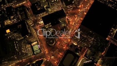 Aerial night vertical view of lights on skyscrapers, USA