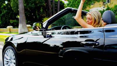 Girlfriends with Their Luxury Car